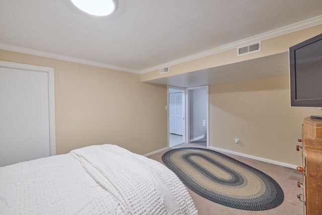 carpeted bedroom featuring crown molding