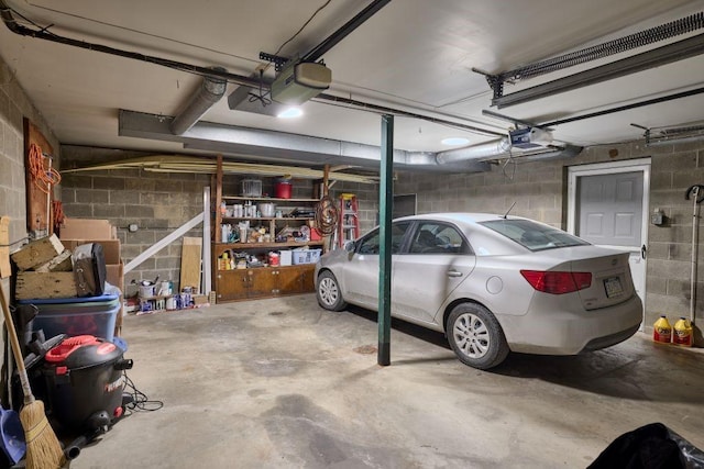 garage featuring a garage door opener