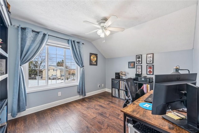 office space featuring ceiling fan, vaulted ceiling, dark hardwood / wood-style floors, and a textured ceiling