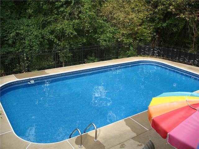 view of pool featuring a fenced backyard and a fenced in pool