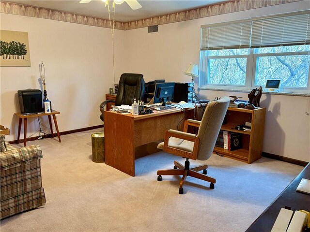 office space with ceiling fan and light colored carpet