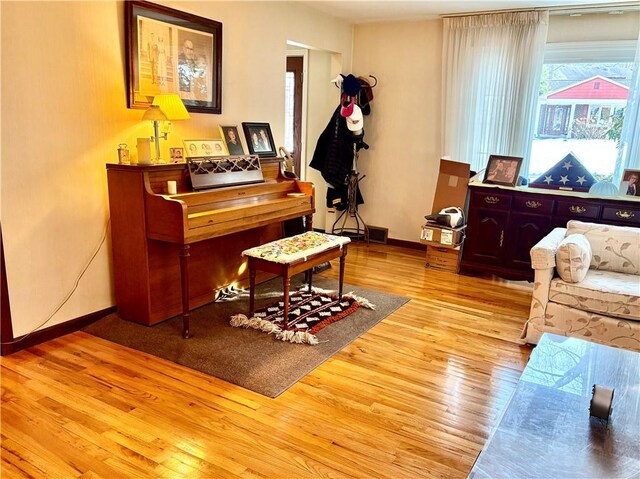 sitting room featuring hardwood / wood-style flooring