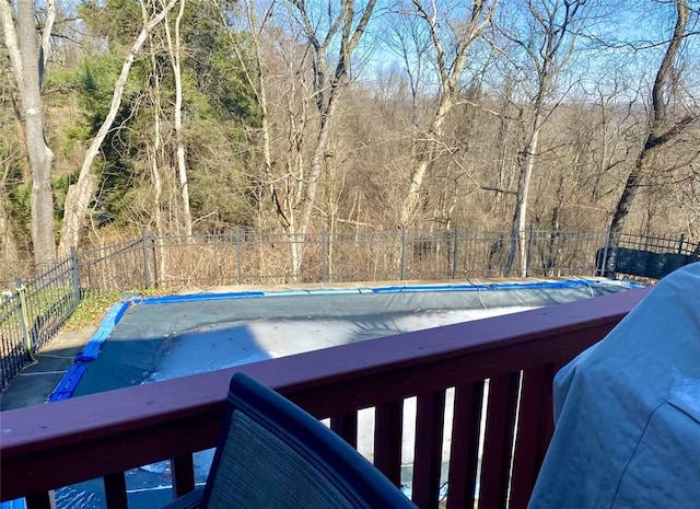 view of pool featuring a swimming pool and a fenced backyard