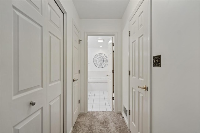 corridor featuring carpet floors