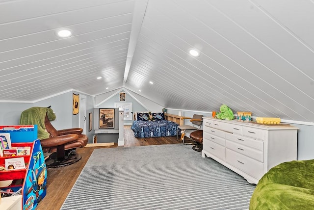 bedroom featuring wood-type flooring and vaulted ceiling