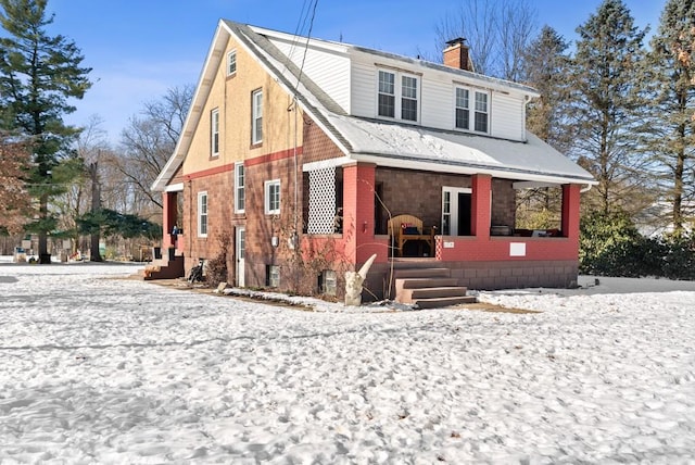 view of front of home featuring covered porch