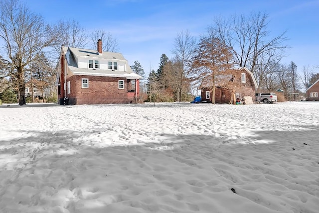 view of yard covered in snow