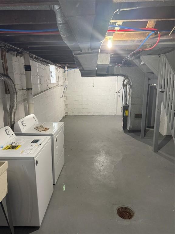 basement featuring separate washer and dryer