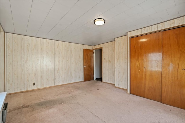 unfurnished bedroom with light carpet