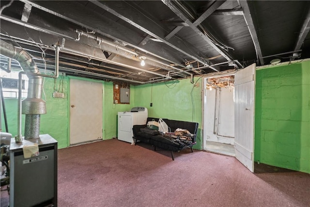 basement with electric panel and independent washer and dryer