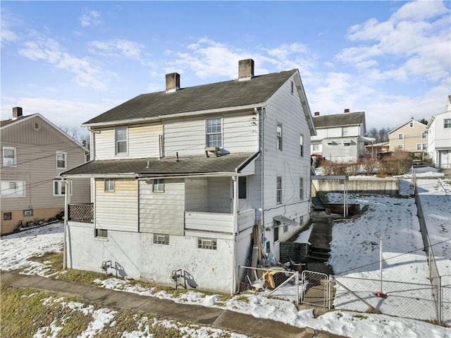 view of snow covered house