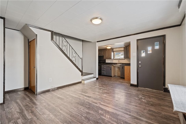 unfurnished living room featuring dark wood-type flooring