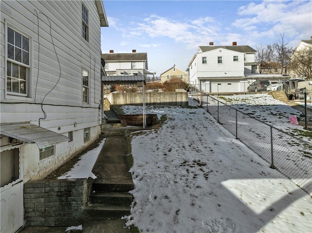 view of yard covered in snow