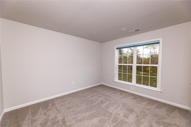 view of carpeted spare room