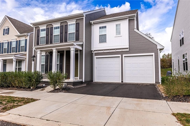 view of front of property with a garage