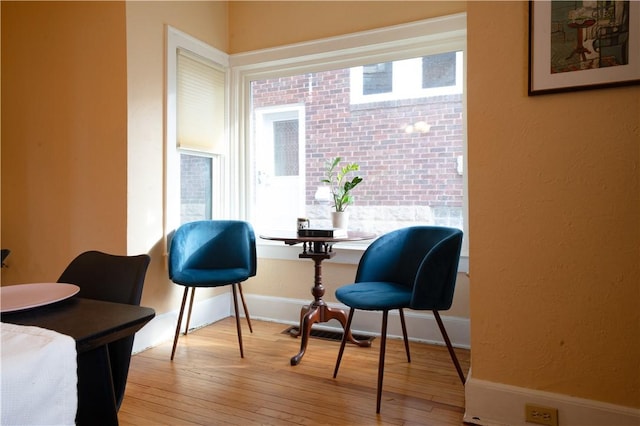 sitting room featuring light wood-type flooring