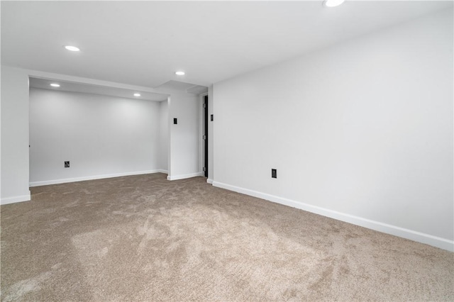 unfurnished room featuring carpet floors