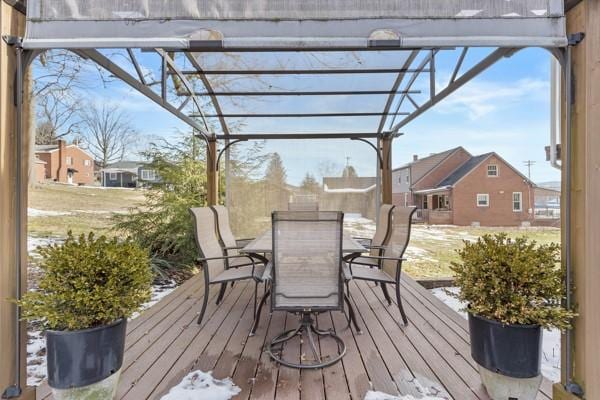 wooden terrace with a pergola