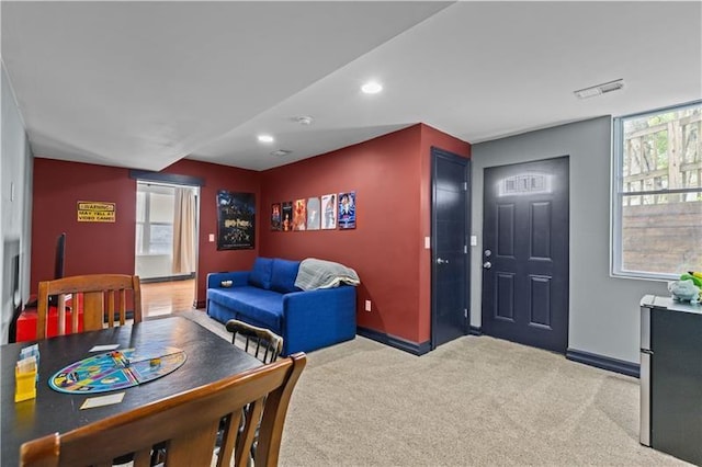 living room featuring light colored carpet