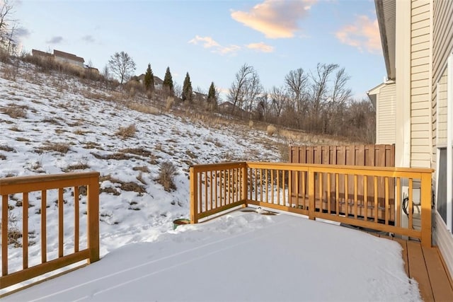 view of snow covered deck