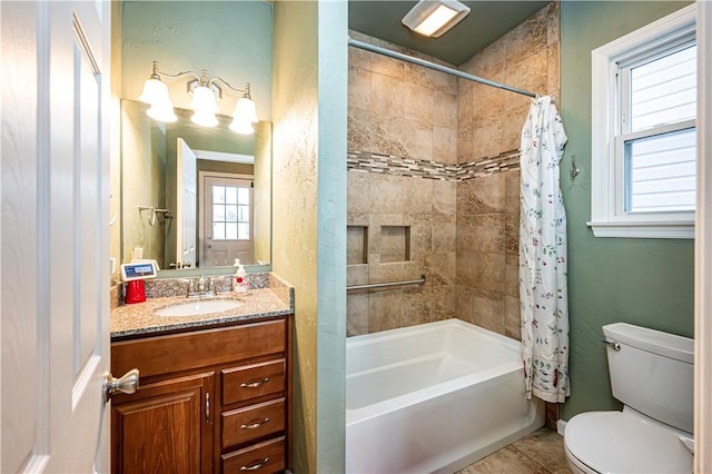 full bathroom featuring vanity, toilet, and shower / bath combo