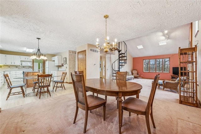 carpeted dining room with an inviting chandelier, vaulted ceiling, and a textured ceiling