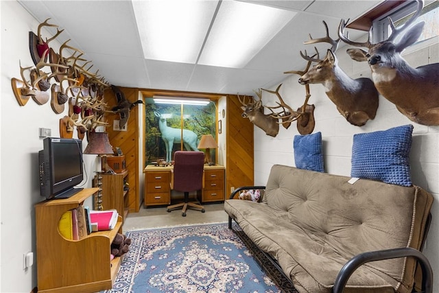 115 Mill Creek Rd, Mill Creek, PA 16145 - office area featuring wood walls and concrete floors