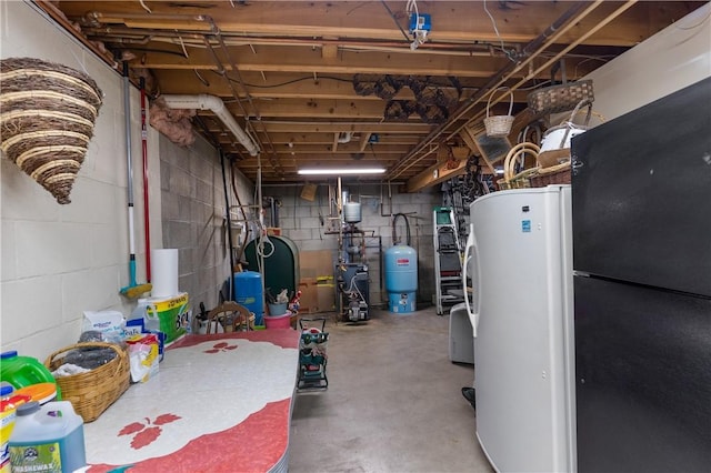 basement with white fridge