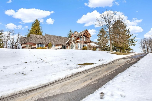 view of log cabin