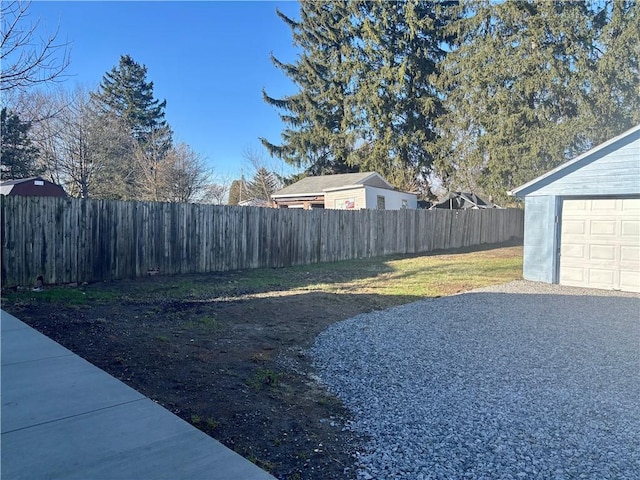 view of yard with a garage