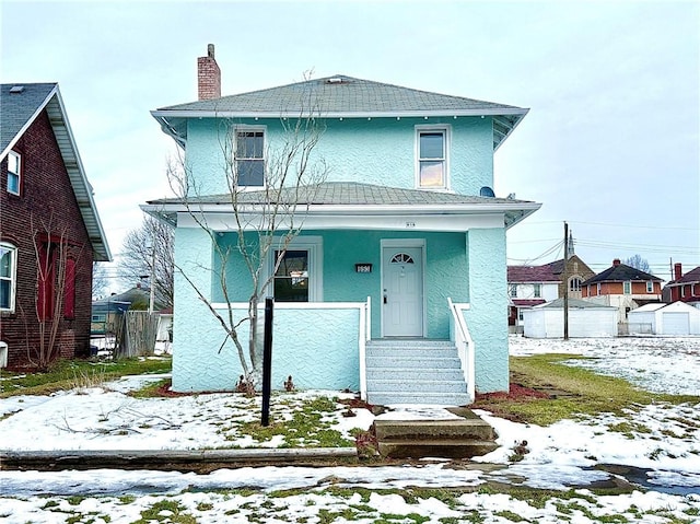 view of property featuring a porch