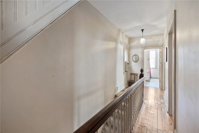 corridor featuring light hardwood / wood-style floors