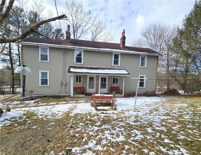 view of snow covered house