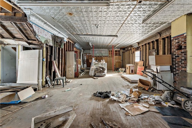 miscellaneous room featuring wood-type flooring