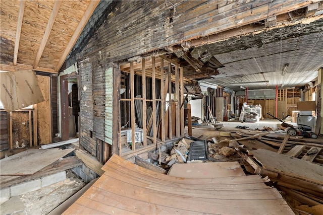 miscellaneous room featuring lofted ceiling