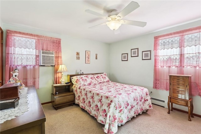 carpeted bedroom with a wall mounted air conditioner, a baseboard radiator, and ceiling fan