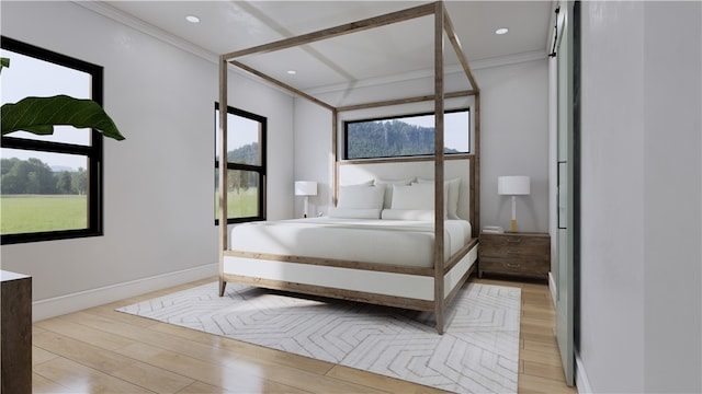 bedroom with multiple windows, ornamental molding, and light hardwood / wood-style floors