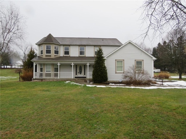 view of front facade featuring a porch and a front yard