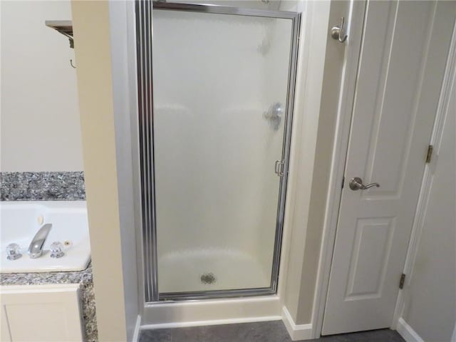 bathroom featuring separate shower and tub