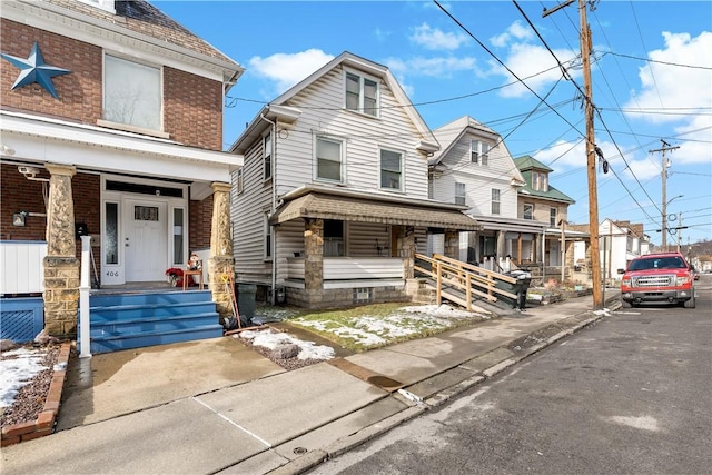 view of front of property featuring covered porch