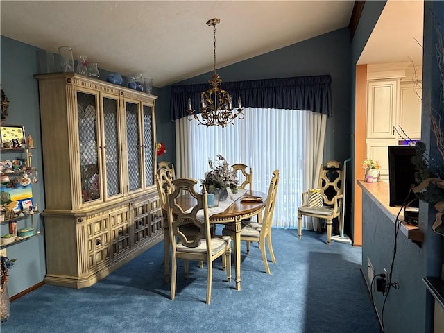 carpeted dining area featuring vaulted ceiling and a chandelier