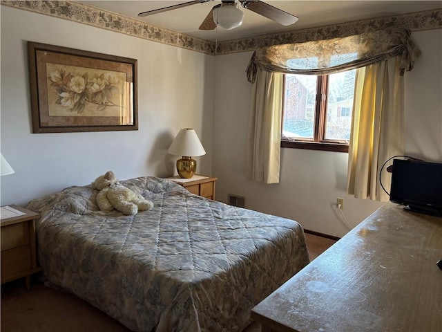 bedroom with visible vents, ceiling fan, and baseboards