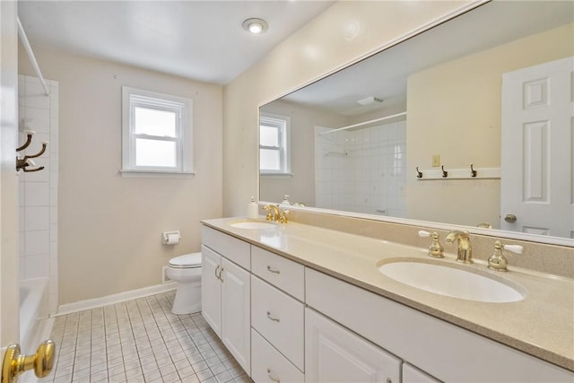 bathroom with tile patterned floors, toilet, and vanity