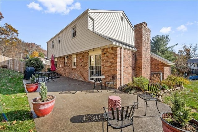 back of house featuring a patio area