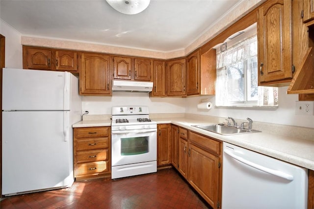 kitchen with crown molding, sink, and white appliances