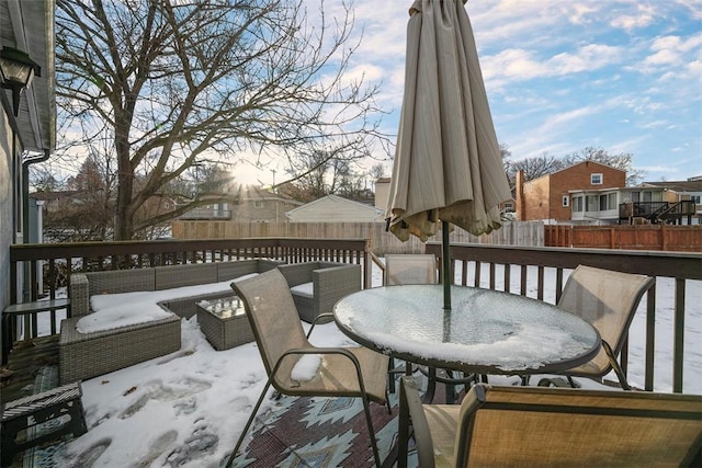 view of snow covered deck