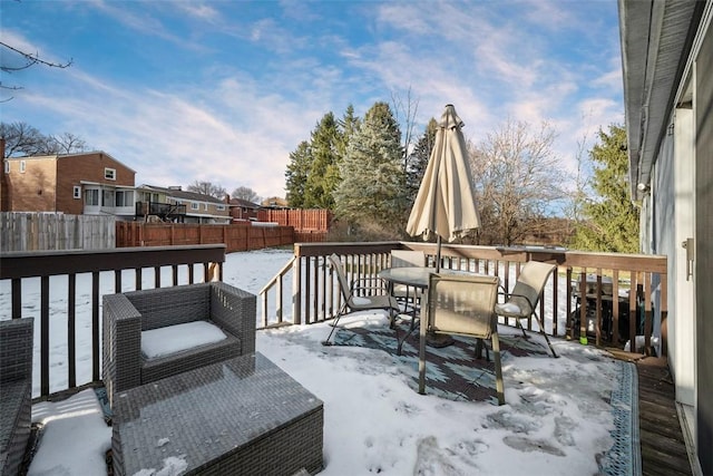 view of snow covered deck