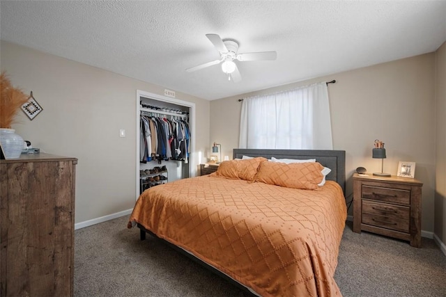 bedroom featuring ceiling fan, carpet floors, a textured ceiling, and a closet