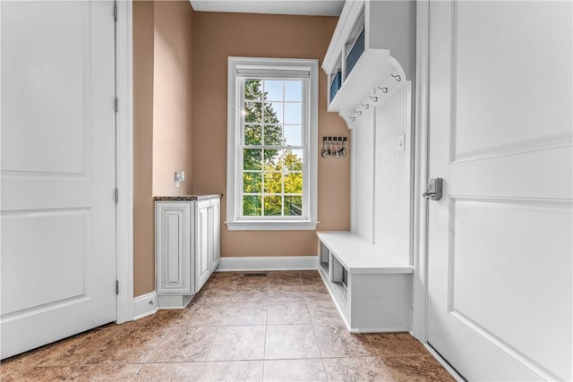 mudroom featuring light tile patterned floors