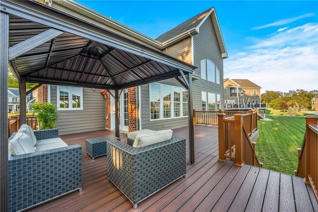 deck featuring an outdoor living space, a gazebo, and a lawn